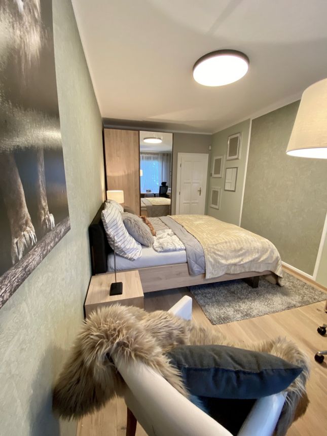 Obrázek - Realizace ložnice s tapetou od BN Walls